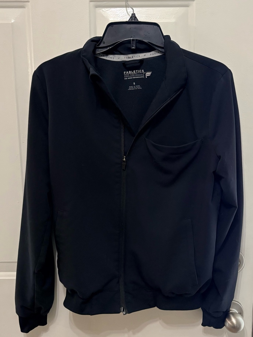 Fabletics scrub set-jacket, shirt, and pants. Reg small black